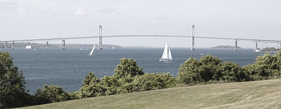 Wide view of the Pell Bridge spanning across the harbor
